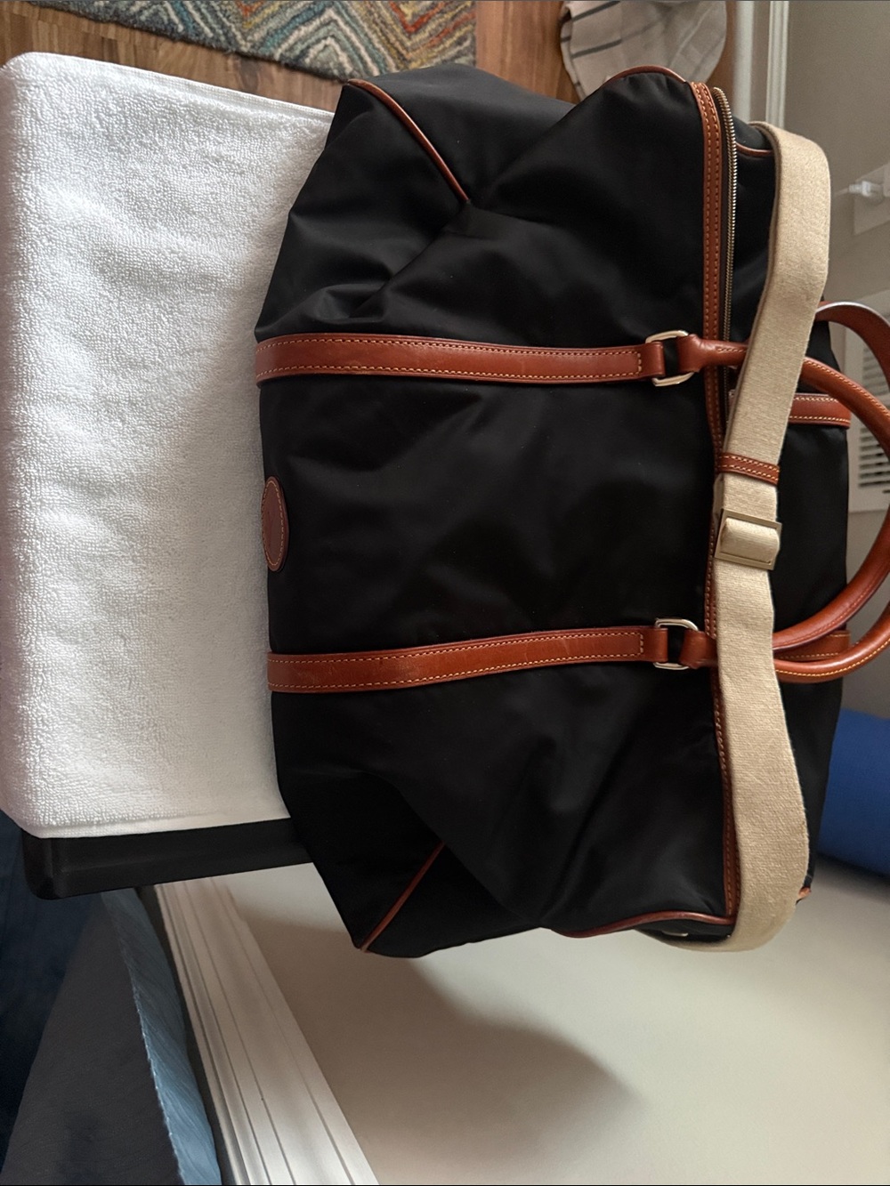 Dooney & Bourke Black Weekender with Brown Trim and Cream Strap